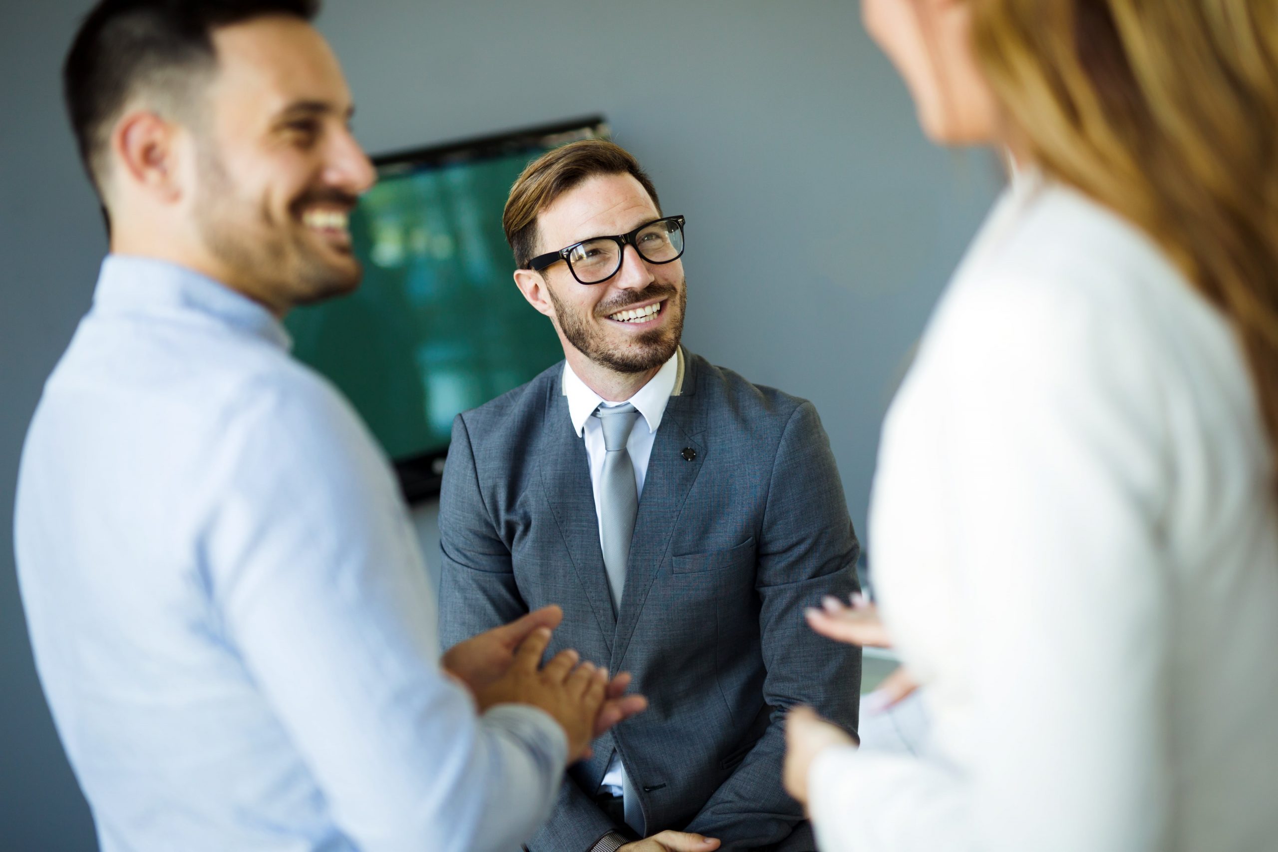 picture-of-business-colleagues-talking-in-office-BMZCJYW-min